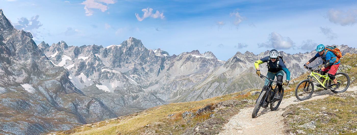 Image of Two People Mountain Biking